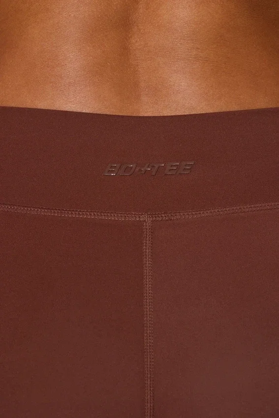 Långa leggings med fickor i brunt Långa leggings med fickor i brunt