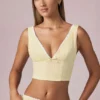 Magda crop top med rosettdetalj i citrongula ränder Magda crop top med rosettdetalj i citrongula ränder