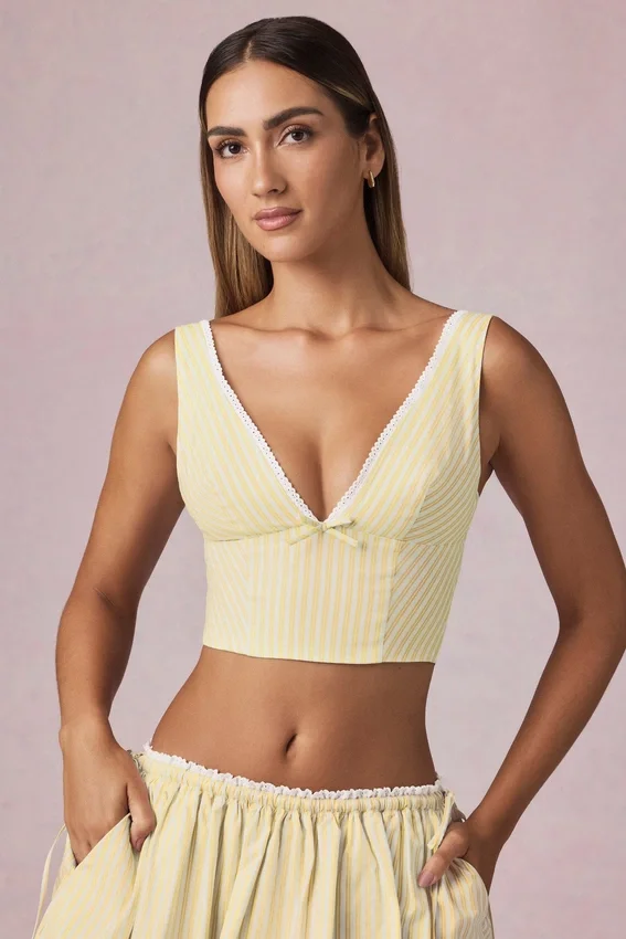 Magda crop top med rosettdetalj i citrongula ränder Magda crop top med rosettdetalj i citrongula ränder