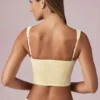 Magda crop top med rosettdetalj i citrongula ränder Magda crop top med rosettdetalj i citrongula ränder