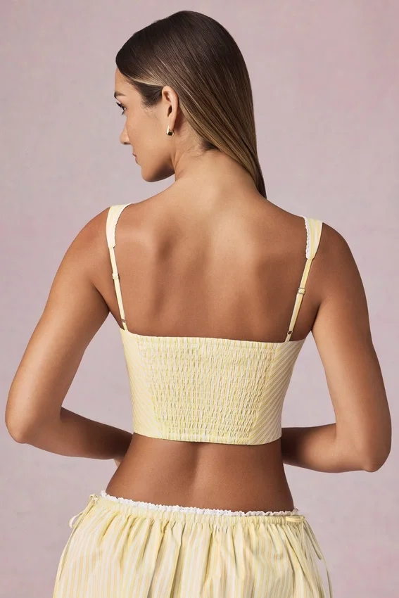 Magda crop top med rosettdetalj i citrongula ränder Magda crop top med rosettdetalj i citrongula ränder