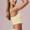 Magda crop top med rosettdetalj i citrongula ränder Magda crop top med rosettdetalj i citrongula ränder