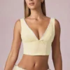 Magda crop top med rosettdetalj i citrongula ränder Magda crop top med rosettdetalj i citrongula ränder