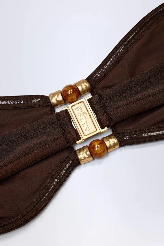 Manava bandeau-bikinitopp med pärlbroderi i mörk choklad Manava bandeau-bikinitopp med pärlbroderi i mörk choklad