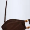 Manava bandeau-bikinitopp med pärlbroderi i mörk choklad Manava bandeau-bikinitopp med pärlbroderi i mörk choklad