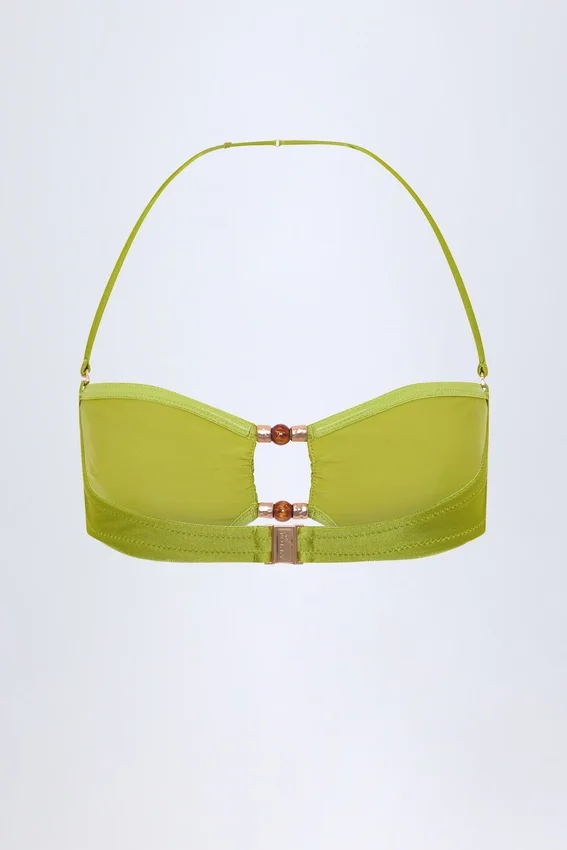 Manava bandeau-bikinitopp med pärlbroderi i olivgrönt Manava bandeau-bikinitopp med pärlbroderi i olivgrönt