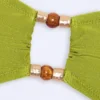 Manava bandeau-bikinitopp med pärlbroderi i olivgrönt Manava bandeau-bikinitopp med pärlbroderi i olivgrönt
