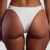 Praslin bandeau-bikinitopp med pärldekor i elfenben Praslin bandeau-bikinitopp med pärldekor i elfenben