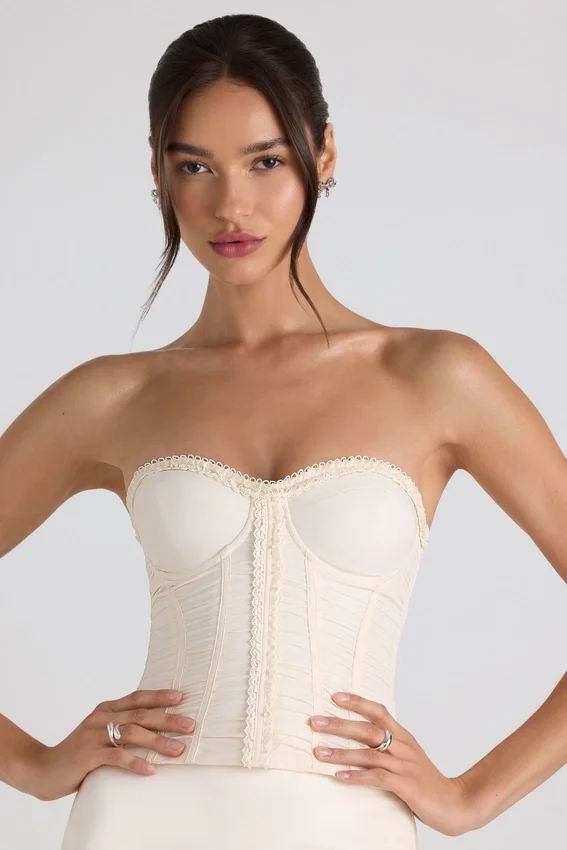 Melvina Ruched Lace-Up Strapless Corset Top i ivory Melvina Ruched Lace-Up Strapless Corset Top i ivory