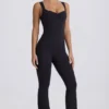 Mjuk Active-jumpsuit med utskärning i ryggen i svart Mjuk Active-jumpsuit med utskärning i ryggen i svart