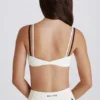 Mjuk Active-sport-BH med vridet ryggparti i lager-på-lager-stil i elfenben Mjuk Active-sport-BH med vridet ryggparti i lager-på-lager-stil i elfenben