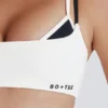 Mjuk Active-sport-BH med vridet ryggparti i lager-på-lager-stil i elfenben Mjuk Active-sport-BH med vridet ryggparti i lager-på-lager-stil i elfenben