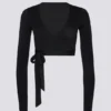 Mjuk jersey-crop-top med omlott i svart Mjuk jersey-crop-top med omlott i svart