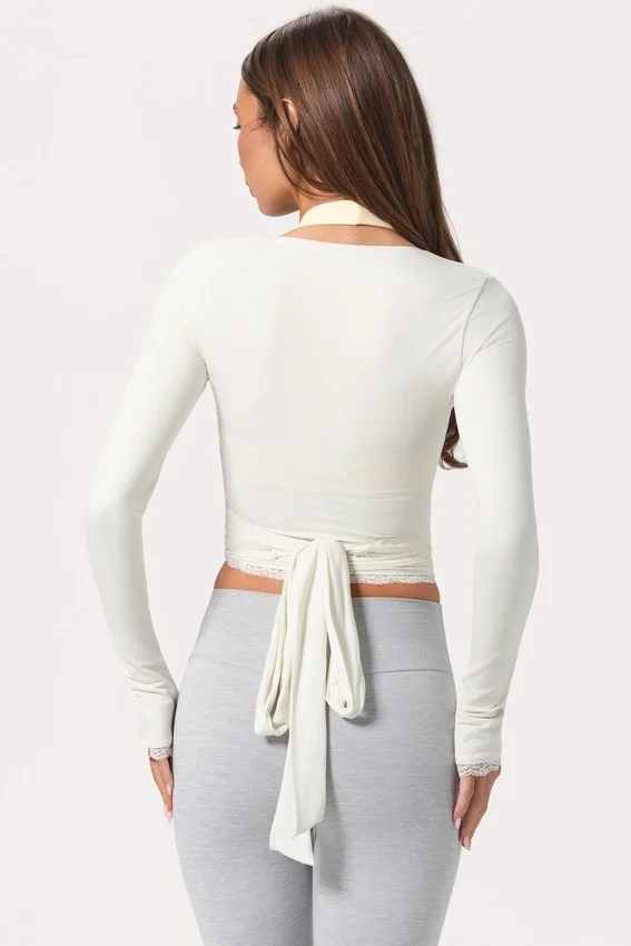 Mjuk jersey-wrap-toppar i mjölkvit Mjuk jersey-wrap-toppar i mjölkvit