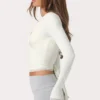 Mjuk jersey-wrap-toppar i mjölkvit Mjuk jersey-wrap-toppar i mjölkvit