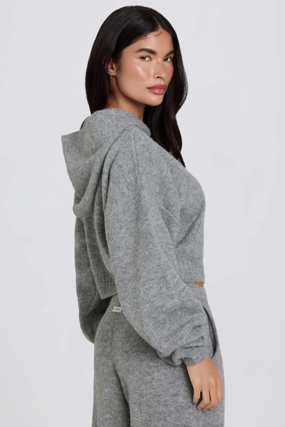 Mjuk, kort hoodie i grått med dragkedja Mjuk, kort hoodie i grått med dragkedja