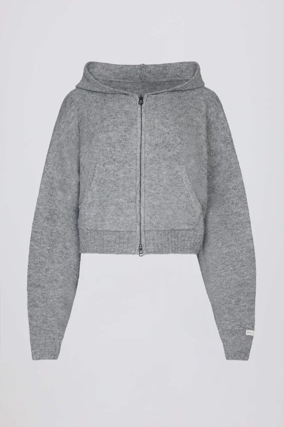 Mjuk, kort hoodie i grått med dragkedja Mjuk, kort hoodie i grått med dragkedja