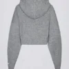 Mjuk, kort hoodie i grått med dragkedja Mjuk, kort hoodie i grått med dragkedja