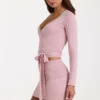 Mjuk stickad wrap-top i rosa