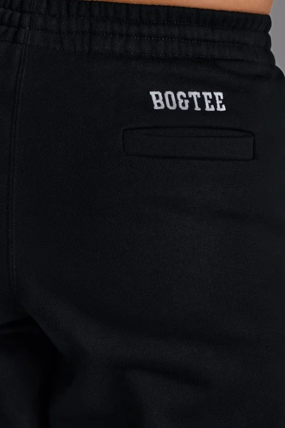 Mjuka joggingbyxor i bomullsjersey med avslappnad passform och medelhög midja i svart Mjuka joggingbyxor i bomullsjersey med avslappnad passform och medelhög midja i svart