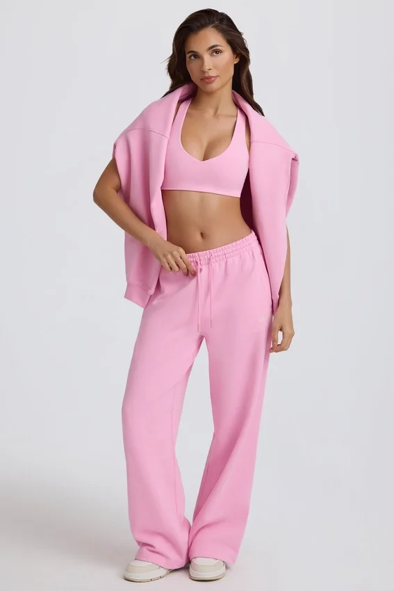 Mjuka joggingbyxor i bomullsjersey med medelhög midja och vida ben i babyrosa Mjuka joggingbyxor i bomullsjersey med medelhög midja och vida ben i babyrosa