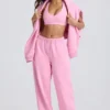 Mjuka joggingbyxor i bomullsjersey med medelhög midja och vida ben i babyrosa Mjuka joggingbyxor i bomullsjersey med medelhög midja och vida ben i babyrosa