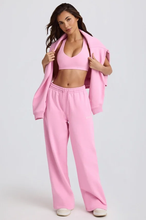 Mjuka joggingbyxor i bomullsjersey med medelhög midja och vida ben i babyrosa Mjuka joggingbyxor i bomullsjersey med medelhög midja och vida ben i babyrosa
