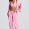 Mjuka joggingbyxor i bomullsjersey med medelhög midja och vida ben i babyrosa Mjuka joggingbyxor i bomullsjersey med medelhög midja och vida ben i babyrosa
