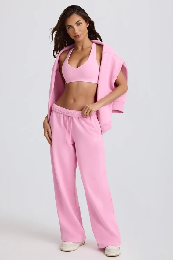Mjuka joggingbyxor i bomullsjersey med medelhög midja och vida ben i babyrosa Mjuka joggingbyxor i bomullsjersey med medelhög midja och vida ben i babyrosa