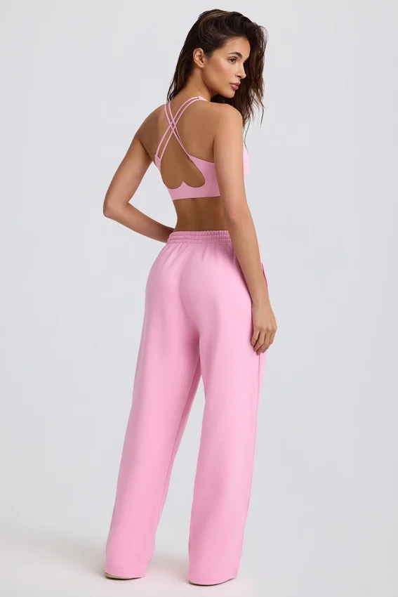 Mjuka joggingbyxor i bomullsjersey med medelhög midja och vida ben i babyrosa Mjuka joggingbyxor i bomullsjersey med medelhög midja och vida ben i babyrosa