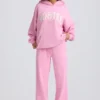 Mjuka joggingbyxor i bomullsjersey med medelhög midja och vida ben i babyrosa Mjuka joggingbyxor i bomullsjersey med medelhög midja och vida ben i babyrosa