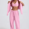 Mjuka joggingbyxor i bomullsjersey med medelhög midja och vida ben i babyrosa Mjuka joggingbyxor i bomullsjersey med medelhög midja och vida ben i babyrosa