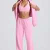 Mjuka joggingbyxor i bomullsjersey med medelhög midja och vida ben i babyrosa Mjuka joggingbyxor i bomullsjersey med medelhög midja och vida ben i babyrosa