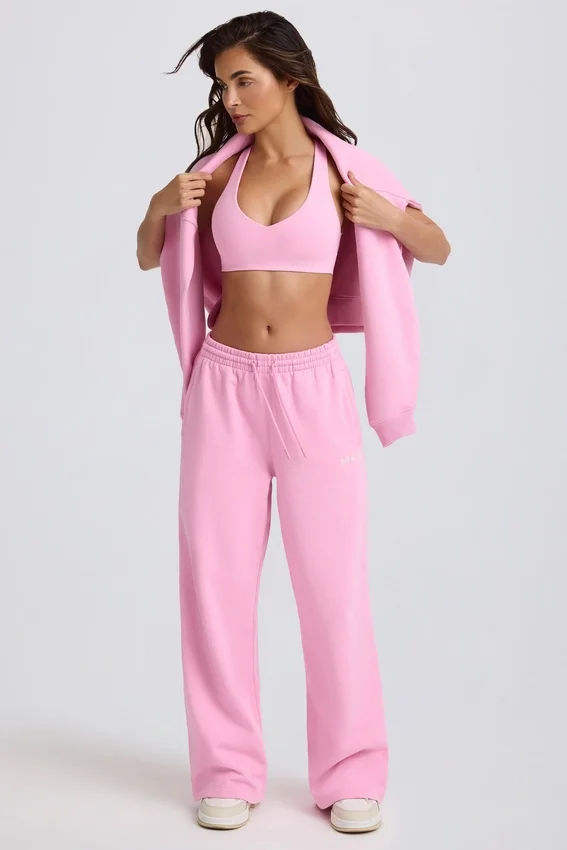 Mjuka joggingbyxor i bomullsjersey med medelhög midja och vida ben i babyrosa Mjuka joggingbyxor i bomullsjersey med medelhög midja och vida ben i babyrosa