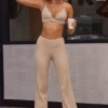 Mjuka ribbade byxor med hög midja och vikbar linning i beige sand Mjuka ribbade byxor med hög midja och vikbar linning i beige sand
