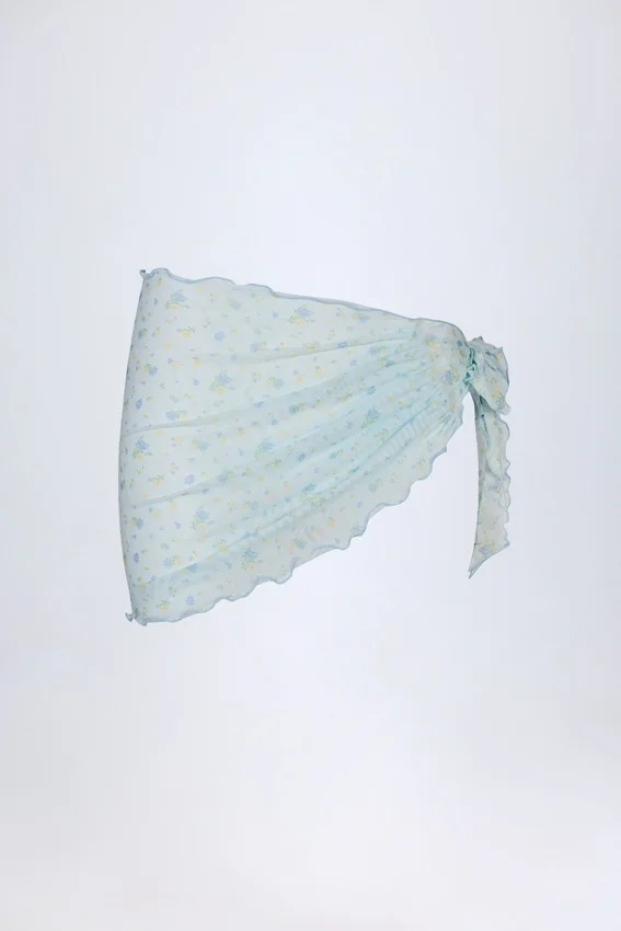 Molinas sarong med knytband i blått blommönster Molinas sarong med knytband i blått blommönster