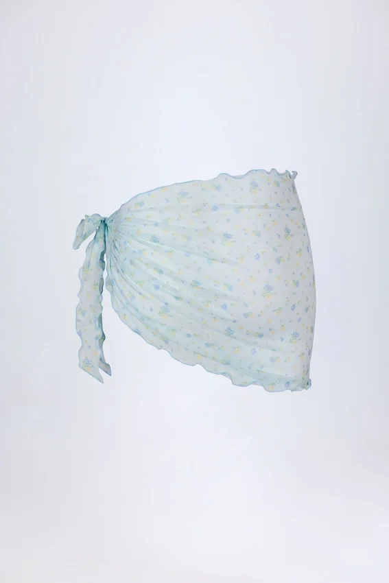 Molinas sarong med knytband i blått blommönster Molinas sarong med knytband i blått blommönster