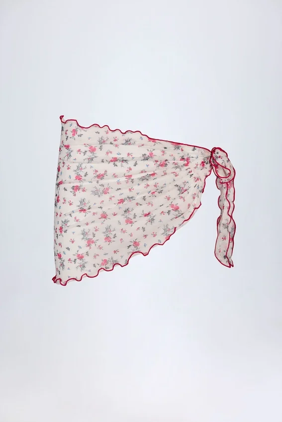 Molinas sarong med knytband i rött blommönster Molinas sarong med knytband i rött blommönster
