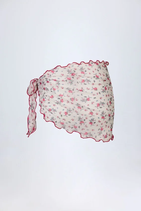 Molinas sarong med knytband i rött blommönster Molinas sarong med knytband i rött blommönster