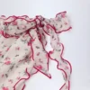 Molinas sarong med knytband i rött blommönster Molinas sarong med knytband i rött blommönster