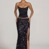 Nevara Embellished Mid-Rise Thigh-Split Maxi Kjol i svartlila Nevara Embellished Mid-Rise Thigh-Split Maxi Kjol i svartlila