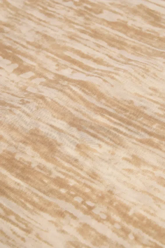 Novina asymmetrisk maxikjol med volanger i beige mönster Novina asymmetrisk maxikjol med volanger i beige mönster