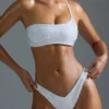 Oh Polly Badkläder: HOTFIX Edition Bandeau-bikinitopp med en axel och dekorationer i vitt Oh Polly Badkläder: HOTFIX Edition Bandeau-bikinitopp med en axel och dekorationer i vitt
