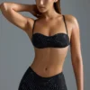 Oh Polly Swim: HOTFIX Edition Embellished Micro Bikini Top i svart Oh Polly Swim: HOTFIX Edition Embellished Micro Bikini Top i svart
