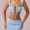 Ottilie Ruffle Tie-Front Crop Top i puderblått Ottilie Ruffle Tie-Front Crop Top i puderblått