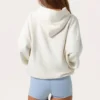 Oversized hoodie med applikation i färgen Milk Oversized hoodie med applikation i färgen Milk