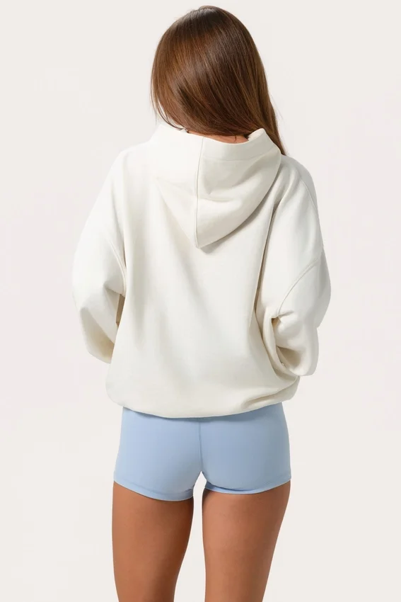 Oversized hoodie med applikation i färgen Milk Oversized hoodie med applikation i färgen Milk