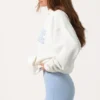 Oversized hoodie med applikation i färgen Milk Oversized hoodie med applikation i färgen Milk