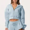Oversized hoodie med dragkedja i puderblått Oversized hoodie med dragkedja i puderblått