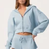 Oversized hoodie med dragkedja i puderblått Oversized hoodie med dragkedja i puderblått
